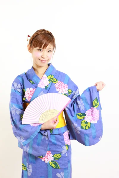 Young woman with paper Fan　 — 图库照片